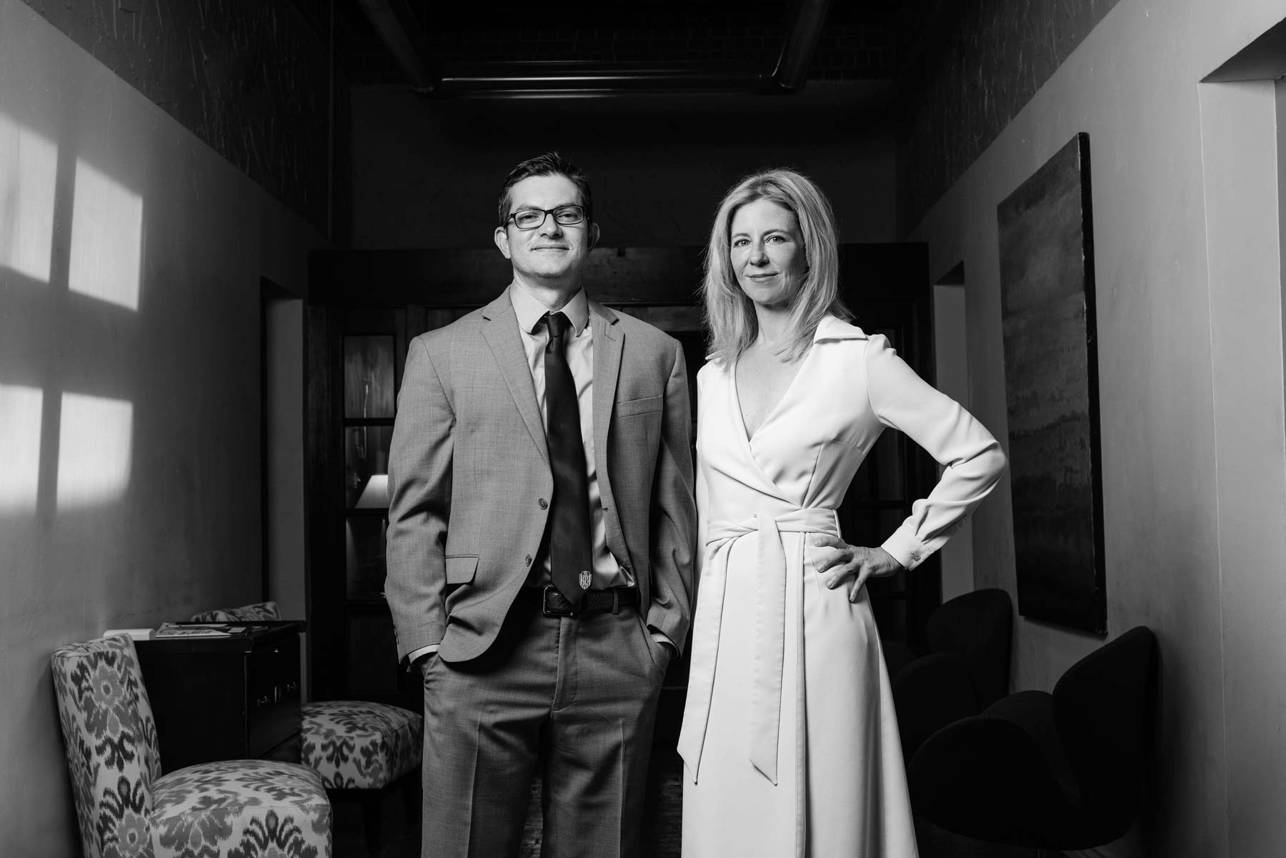 Attorney Adam Flores And Attorney Laura Ives